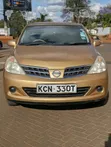 Nissan Tiida 2010 Gold - 1