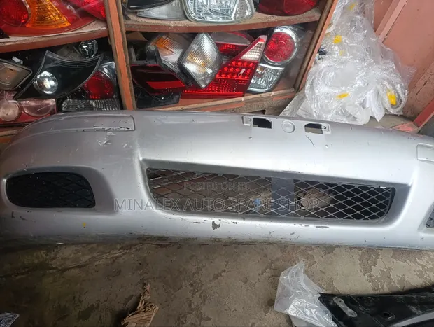 Mitsubishi Lancer Zydia Front Bumper with Foglights - 1