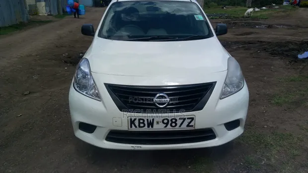 Nissan Almera 2012 Rangi ya L Pearl - 1
