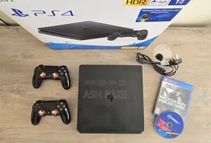 Sony PlayStation 4 Slim (1TB) with 2 Controllers & Games