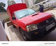 Nissan Hardbody Pickup 2009 Red - 1