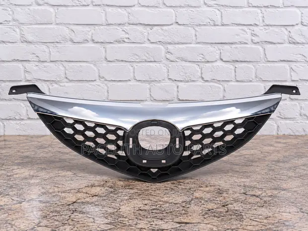 Mazda Axela Saloon Front Center Grille (2007-2009) with Chrome Molding - 1