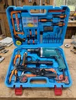 Makita 710W Impact Drill and 117-Piece Tool Set - 2