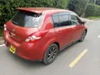 Nissan Tiida 2012 Rangi ya Maroon - 3