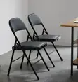 Black Foldable Ergonomic Leather Conference Chair - 1