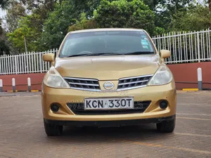 Nissan Tiida 1.5L 16V 2010 Dhahabu