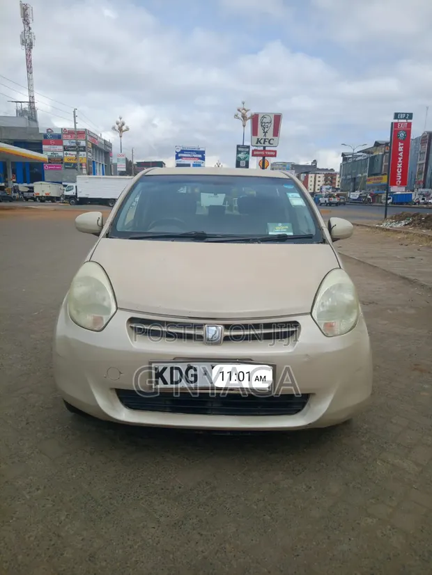 Toyota Passo 2014 Beige - 1