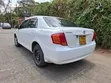 Toyota Axio 1.5 X 2WD 2009 Nyeupe - 5