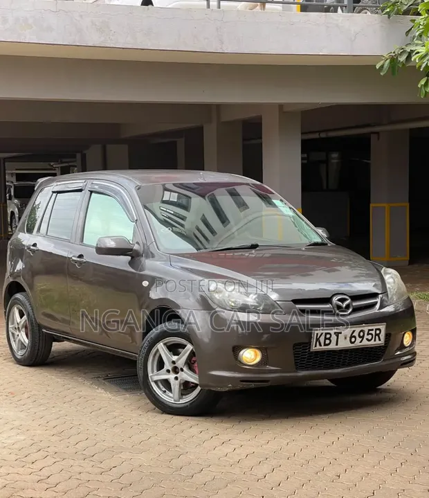 Mazda Demio 2006 Brown - 1