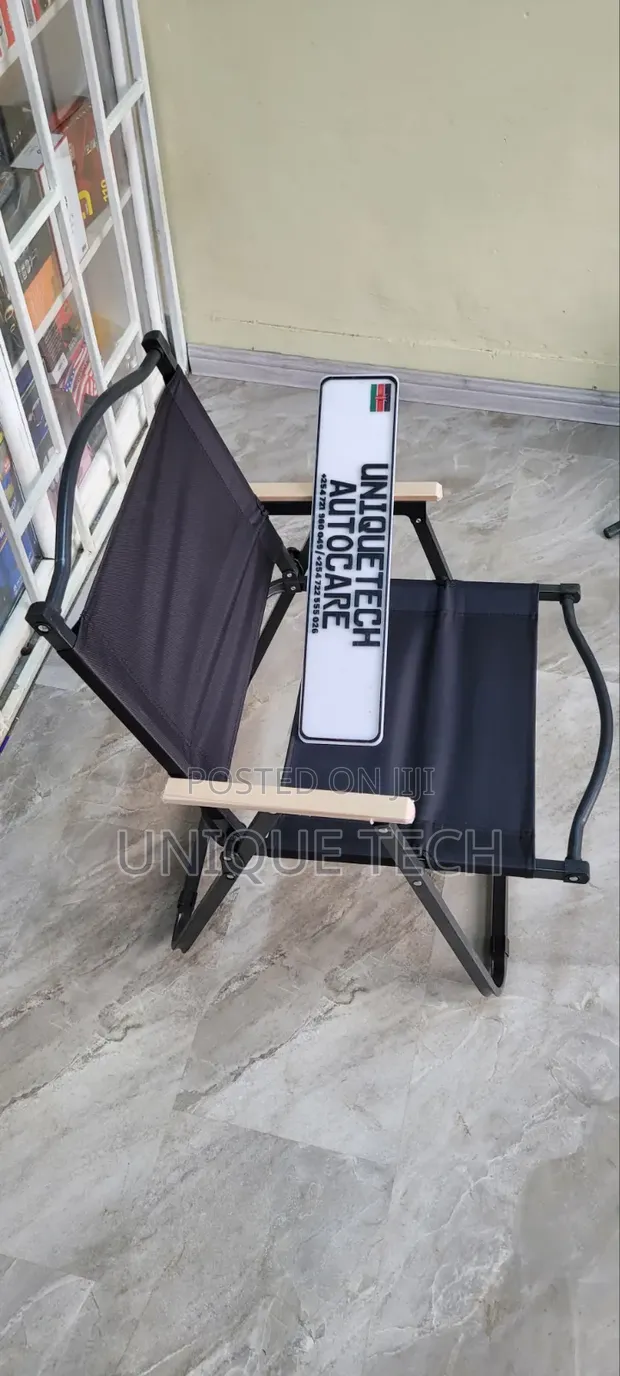 Black Portable Outdoor Chair with Light Wooden Armrests - 1