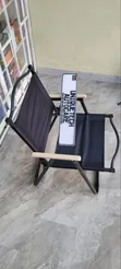 Black Portable Outdoor Chair with Light Wooden Armrests - 1