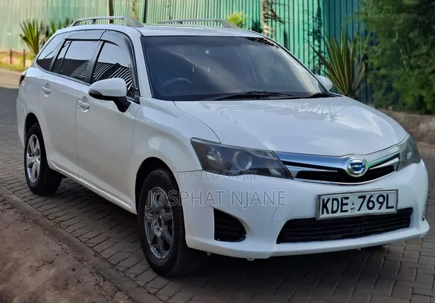 Toyota Corolla Fielder 2014 Nyeupe - 1