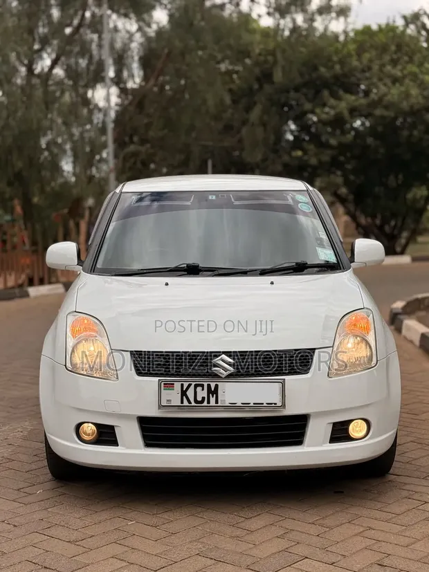 Suzuki Swift 2010 Nyeupe - 1