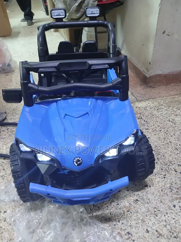 Kids Electric Ride-on UTV/Buggy with Parental Remote - 1