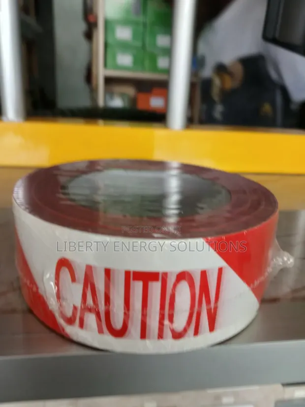 Red and White Caution Barricade Tape - 1