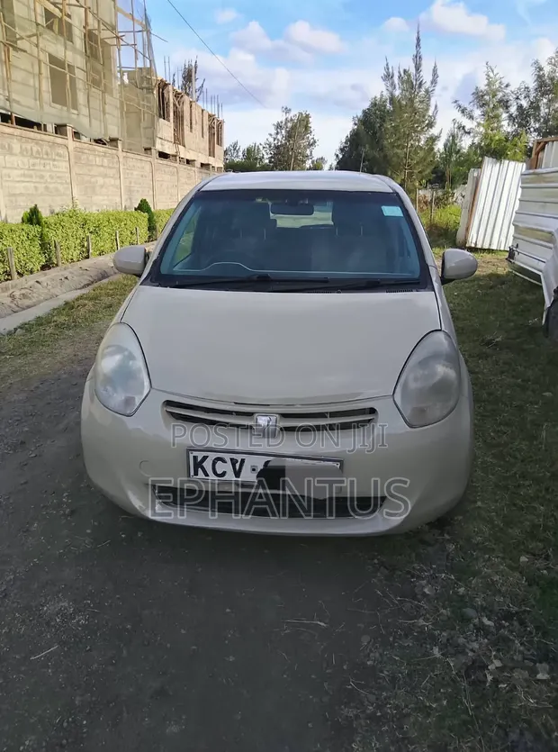 Toyota Passo 1.0 FWD 2012 Beige - 1