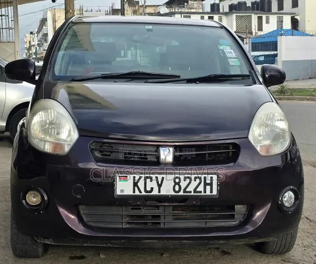 Toyota Passo 2011 Maroon - 1