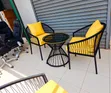 Outdoor 2-Seater Set with Yellow Cushions & Glass Table - 1