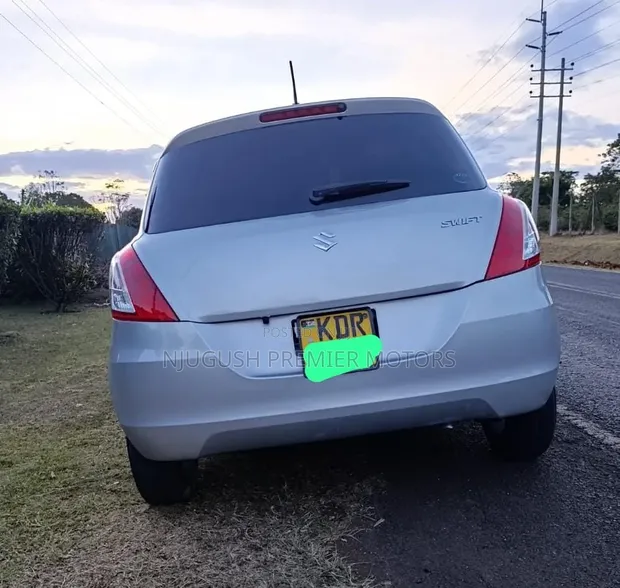 Suzuki Swift 2016 Silver - 1
