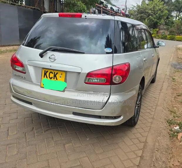 Nissan Wingroad 2009 Silver - 1