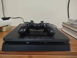 PS4 Slim Console with Free Controller and FC 26 Game