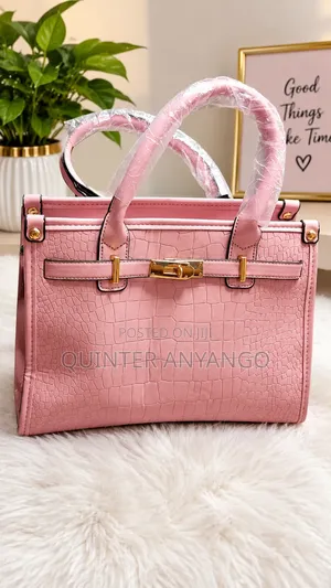 Elegant Pink Crocodile-Pattern Handbag with Gold Buckle