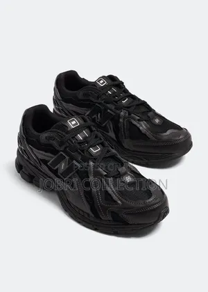 New Balance 1906D Protection Pack Black Leather Sneakers