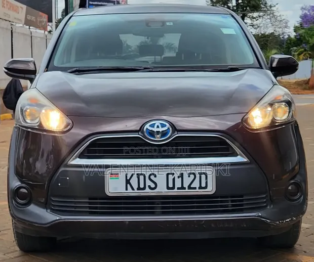 Toyota Sienta 2017 Hybrid Kahawia - 1