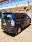 Toyota Voxy X 2WD Minivan ya Viti 8 Mwaka 2008 Rangi ya Zambarau - 2