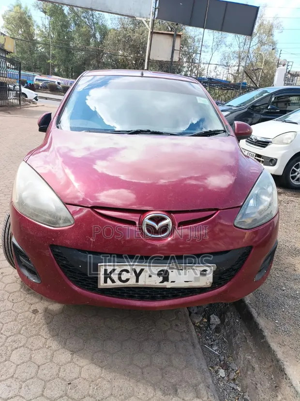 Mazda Demio 2013 Maroon - 1