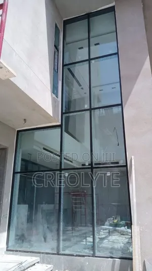 Curtain Walling - Kioo chenye Rangi