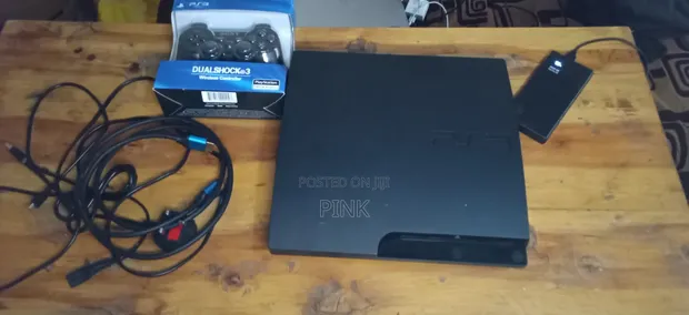 Used PS3 Slim Console with 5 Games & New Controller - 1