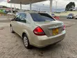 Nissan Tiida 2010 Dhahabu - 3
