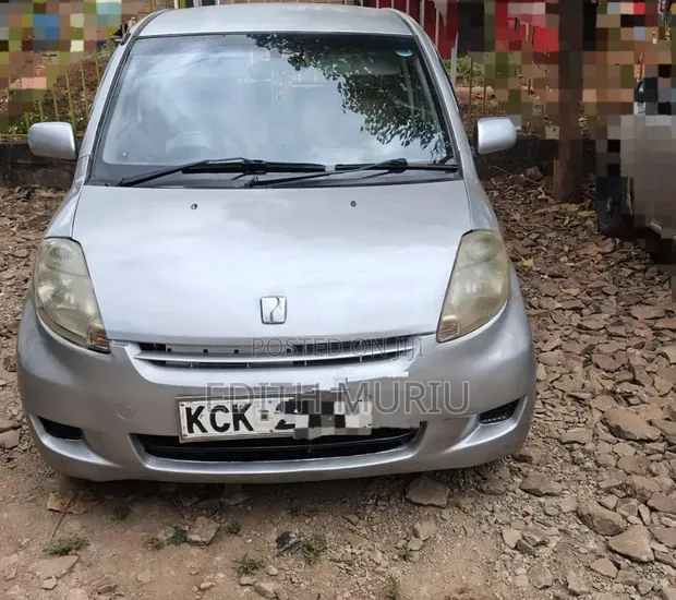 Toyota Passo 2009 Silver - 1