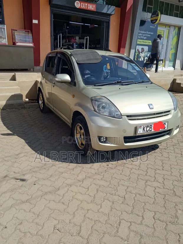 Toyota Passo 2007 Beige - 1