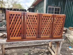 Under-Stairs Mahogany Cabinet with Lattice Doors