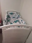 White Wooden Convertible Crib with Floral Bedding - 3