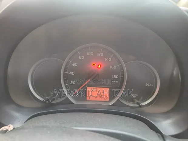 Toyota Vitz 2013 Burgundy - 1