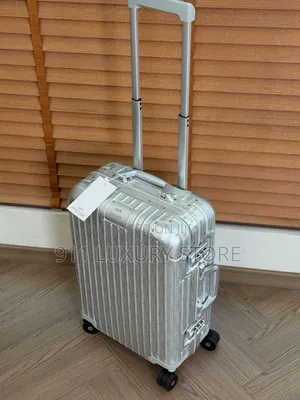 Dior x Rimowa Aluminum Suitcase