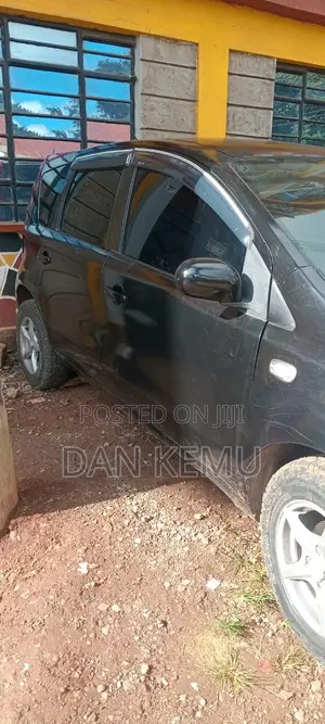 Nissan Note 1.4 2010 Nyeusi