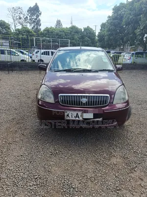 Toyota Vitz 2002 Maroon