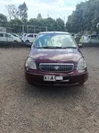 Toyota Vitz 2002 Maroon - 1