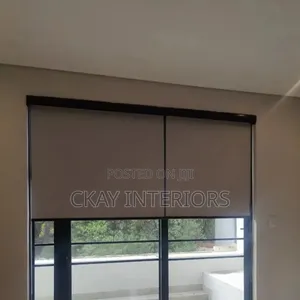 Brown and White Roller Blinds