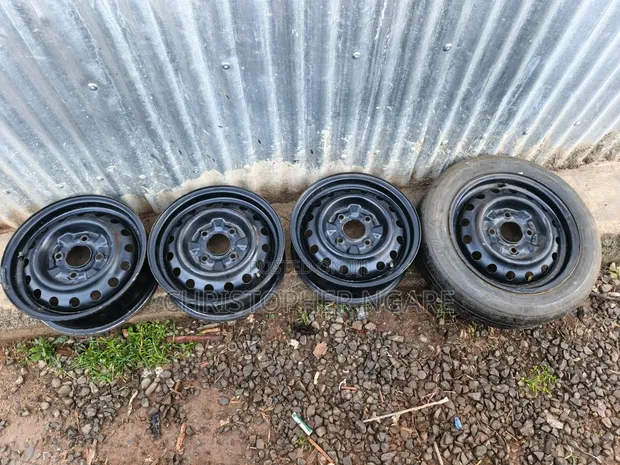 14-Inch R14 Car Rims with Wheel Covers - 1