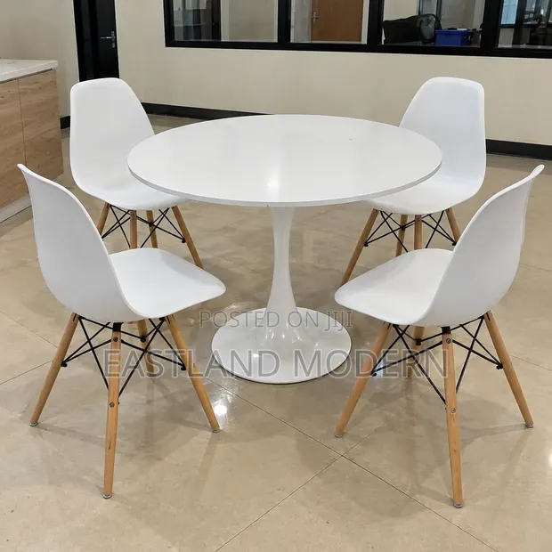 Modern White Round Dining Table with 4 Eames Chairs - 1