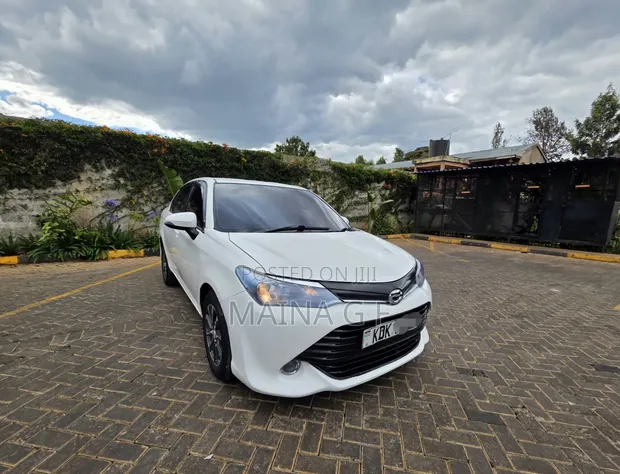 Toyota Axio 1.5 X 2WD 2015 Nyeupe - 1