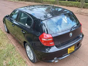 BMW 116i 2011 Nyeusi