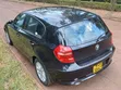 BMW 116i 2011 Nyeusi - 1