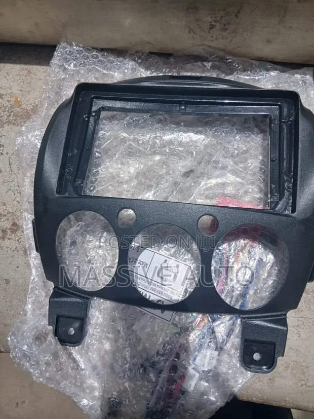 Mazda Demio 9-inch Radio Console Frame - 1