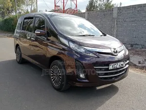 Mazda Biante 2013 Zambarau